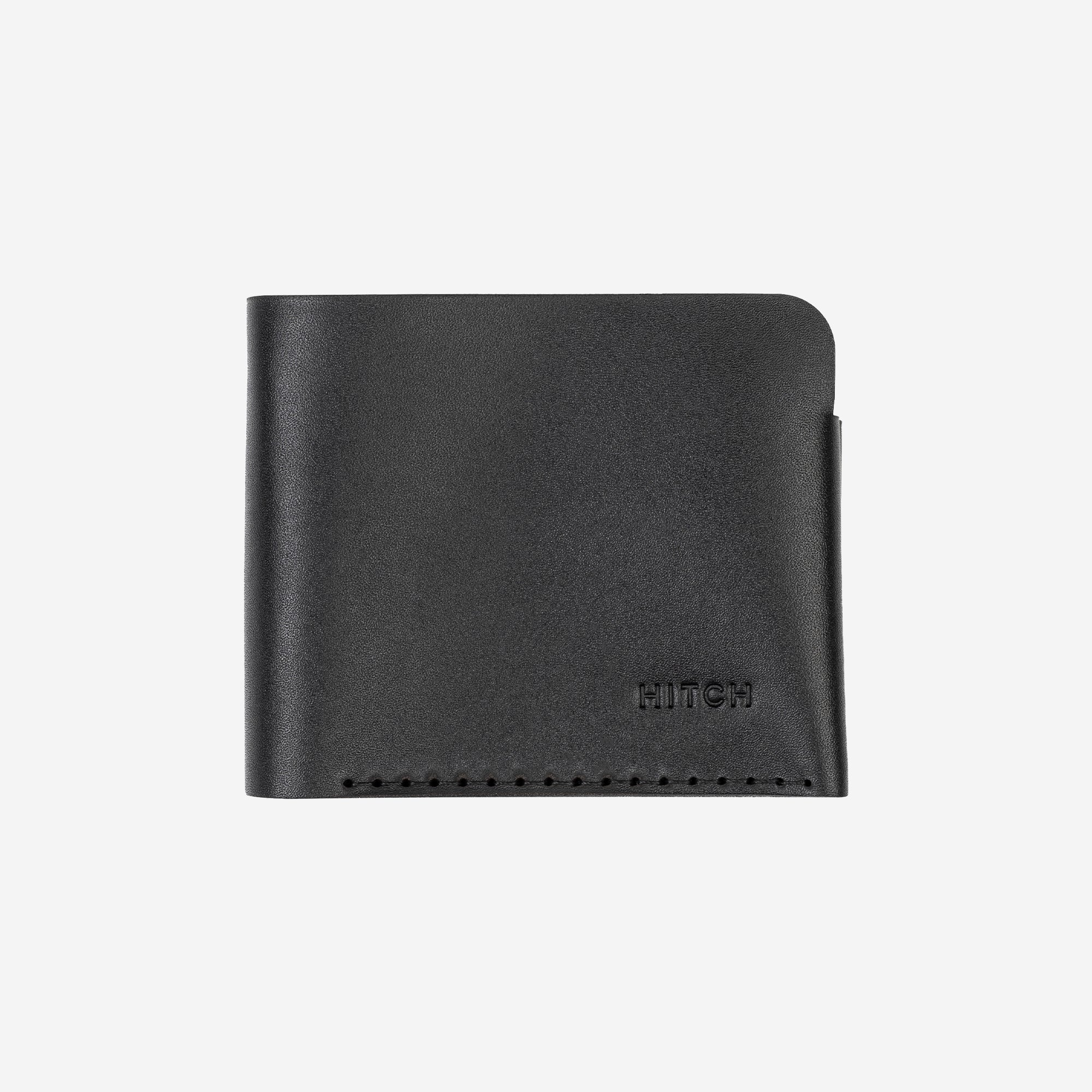Black leather bifold wallet with embossed logo "HITCH", isolated on white background.