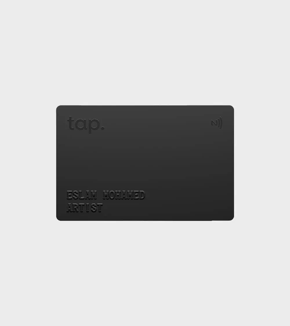 Black business card with NFC chip and embossed text Eslam Mohamed Artist."