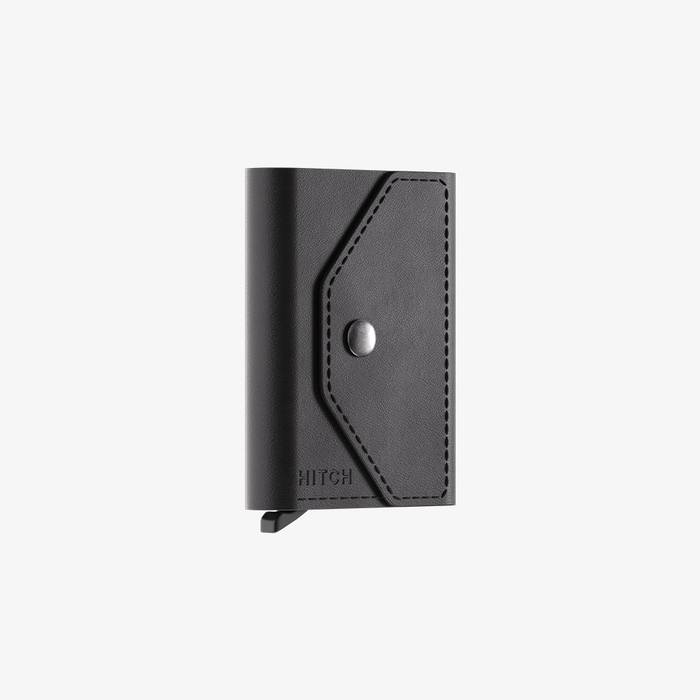 Black leather wallet with snap closure and embossed "HITCH" logo on a white background.