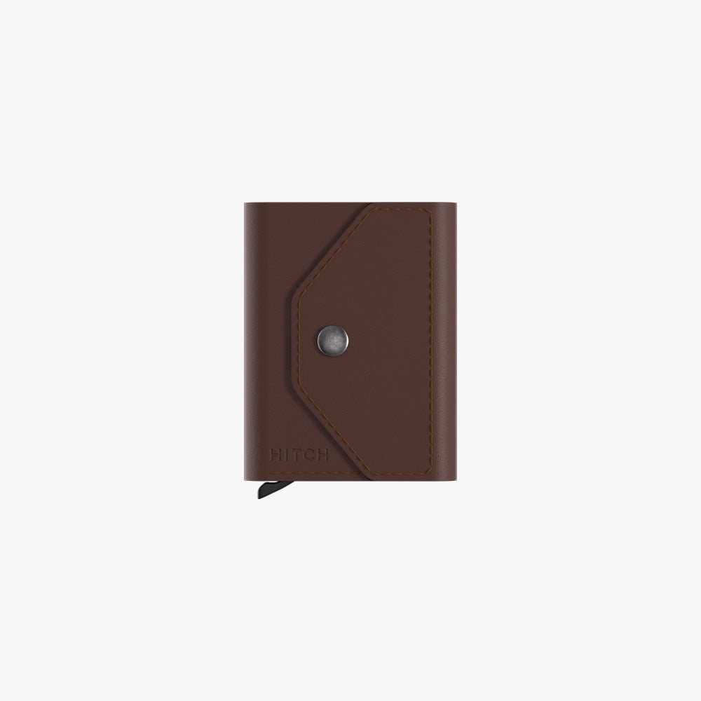 Brown leather wallet with snap closure and embossed "HITCH" logo on a white background.