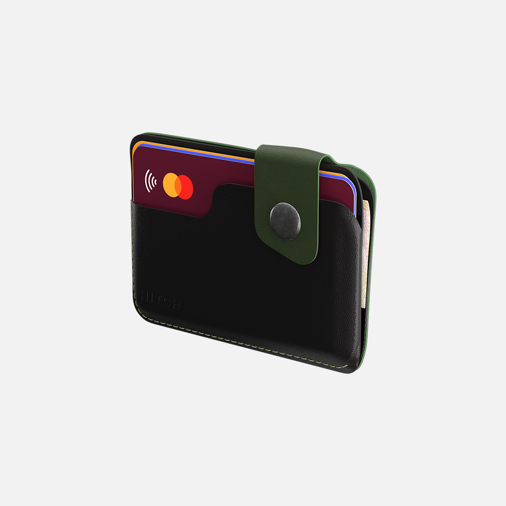 Black leather wallet with contactless NFC credit cards and green strap on a white background.