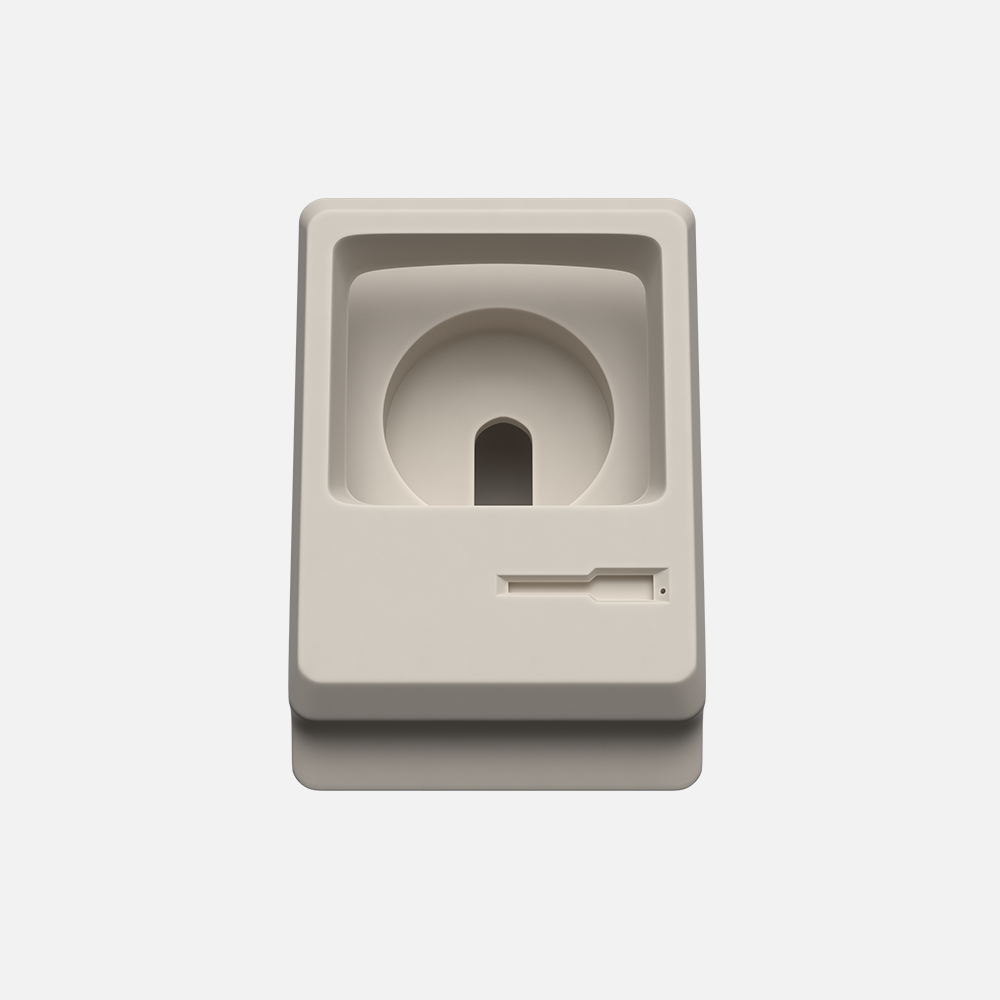 Front view of beige macintosh watch stand without the display on a white background