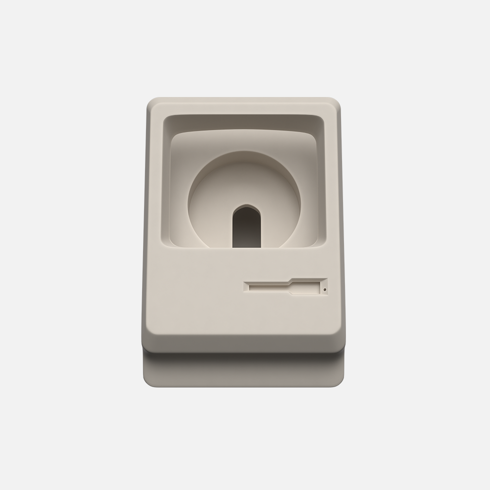  Front view of beige macintosh watch stand without the display on a white background