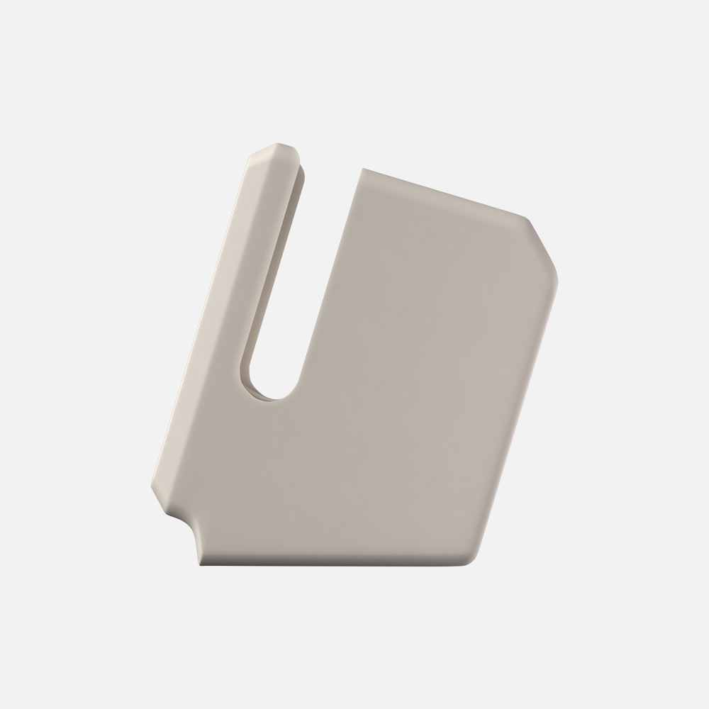 Side view of beige macintosh watch stand without the display on a white background