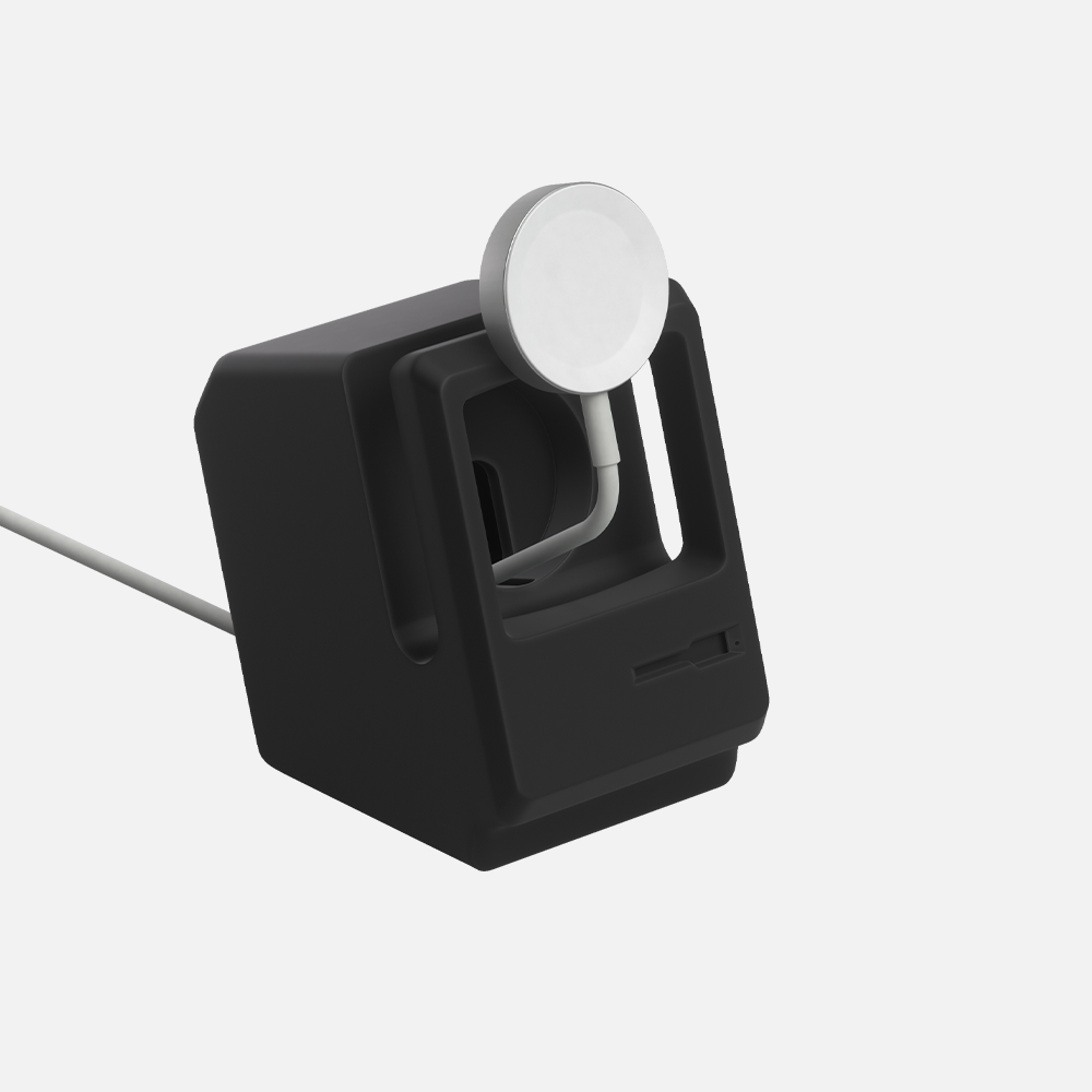 Black Hitch Macintosh Apple watch stand against a white background.