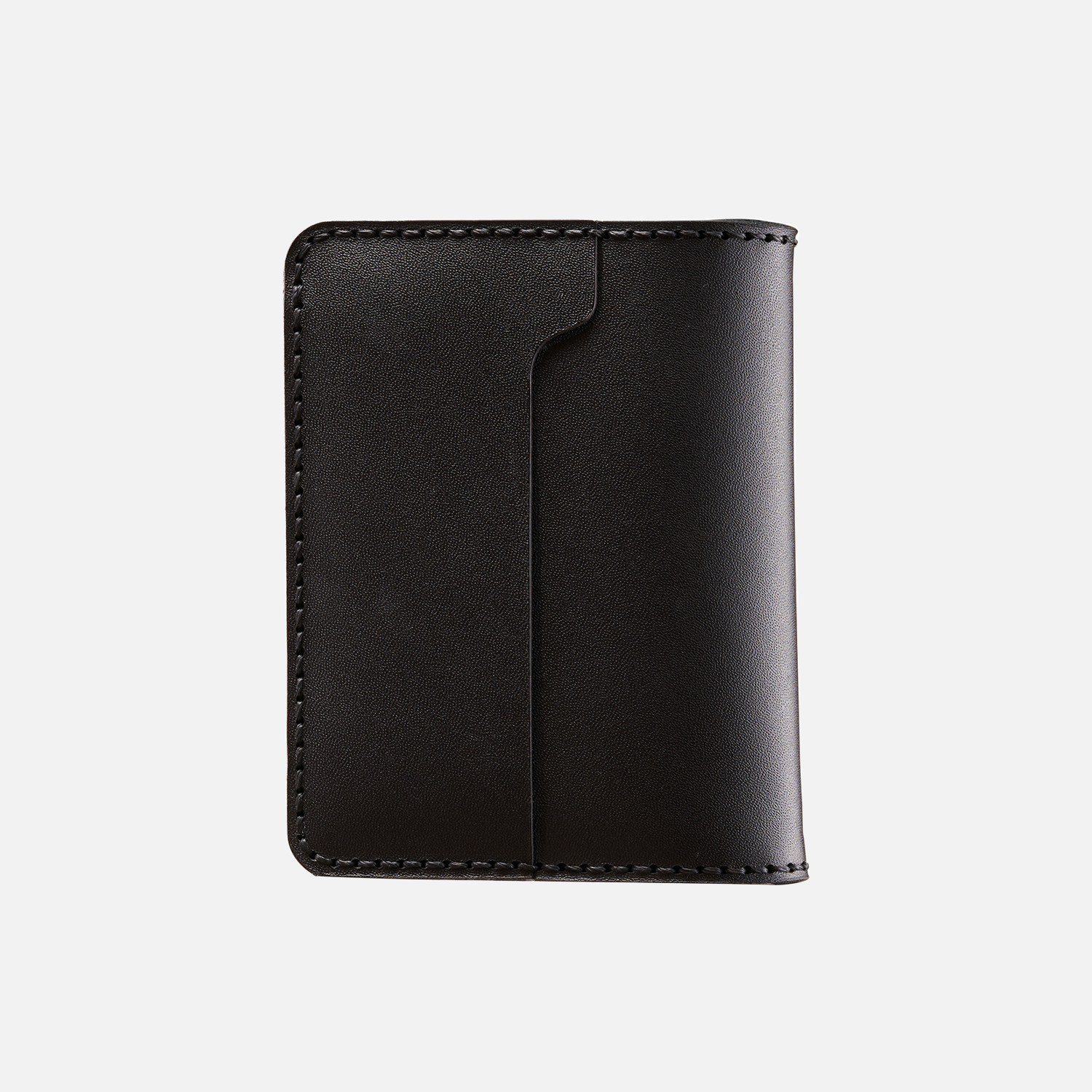 Black leather bifold wallet isolated on white background.