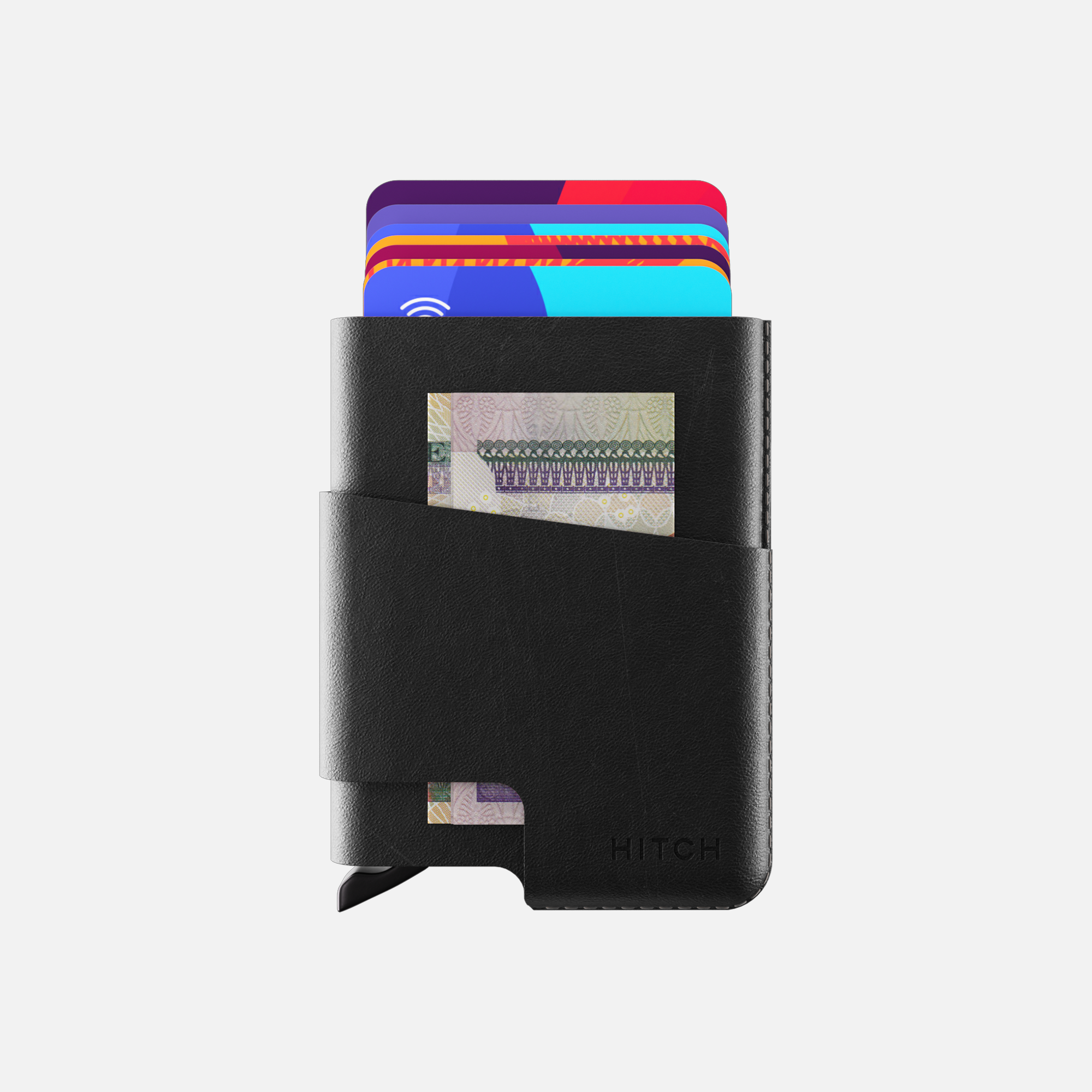 Black minimalist wallet with credit cards and cash sticking out.