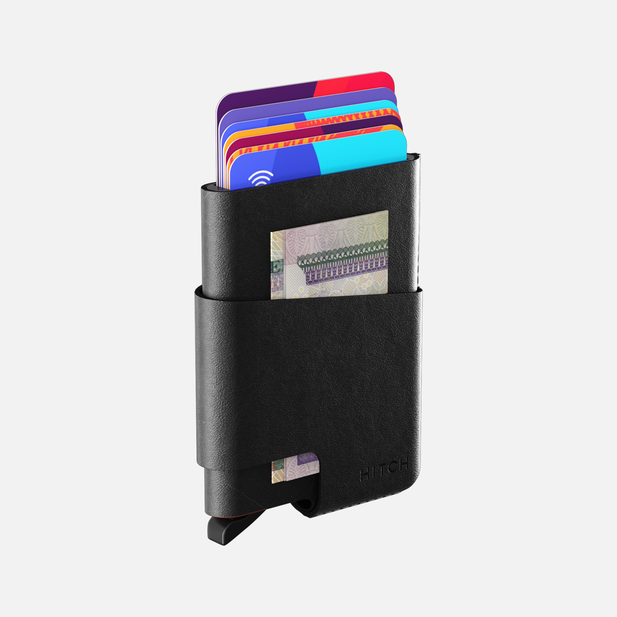 Minimalist wallet with colorful credit cards and money clip.