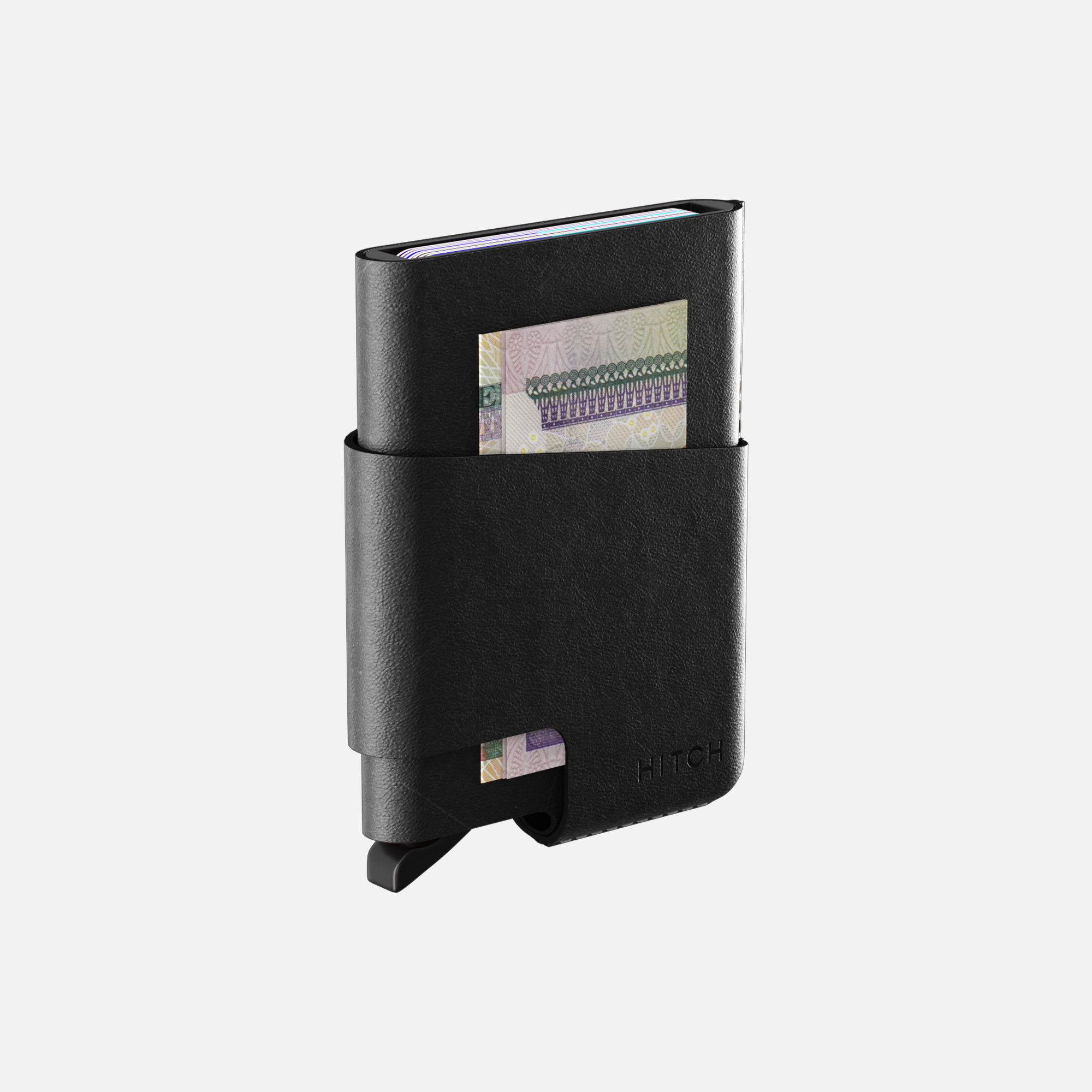 Minimalist black wallet with credit card and cash visible.