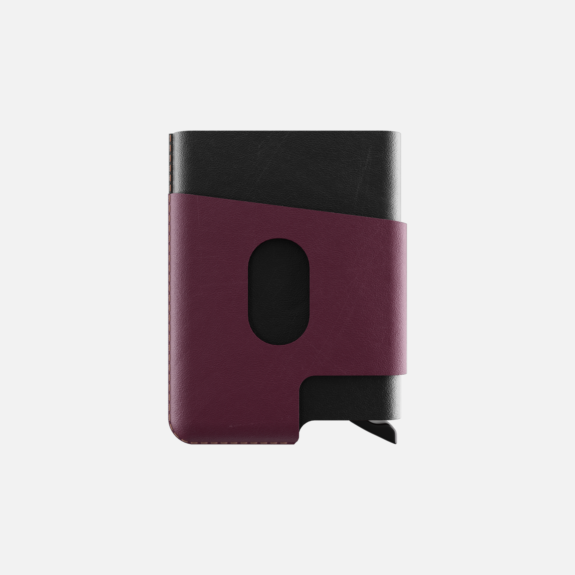 Black and maroon leather notebook with elastic closure, isolated on a white background."