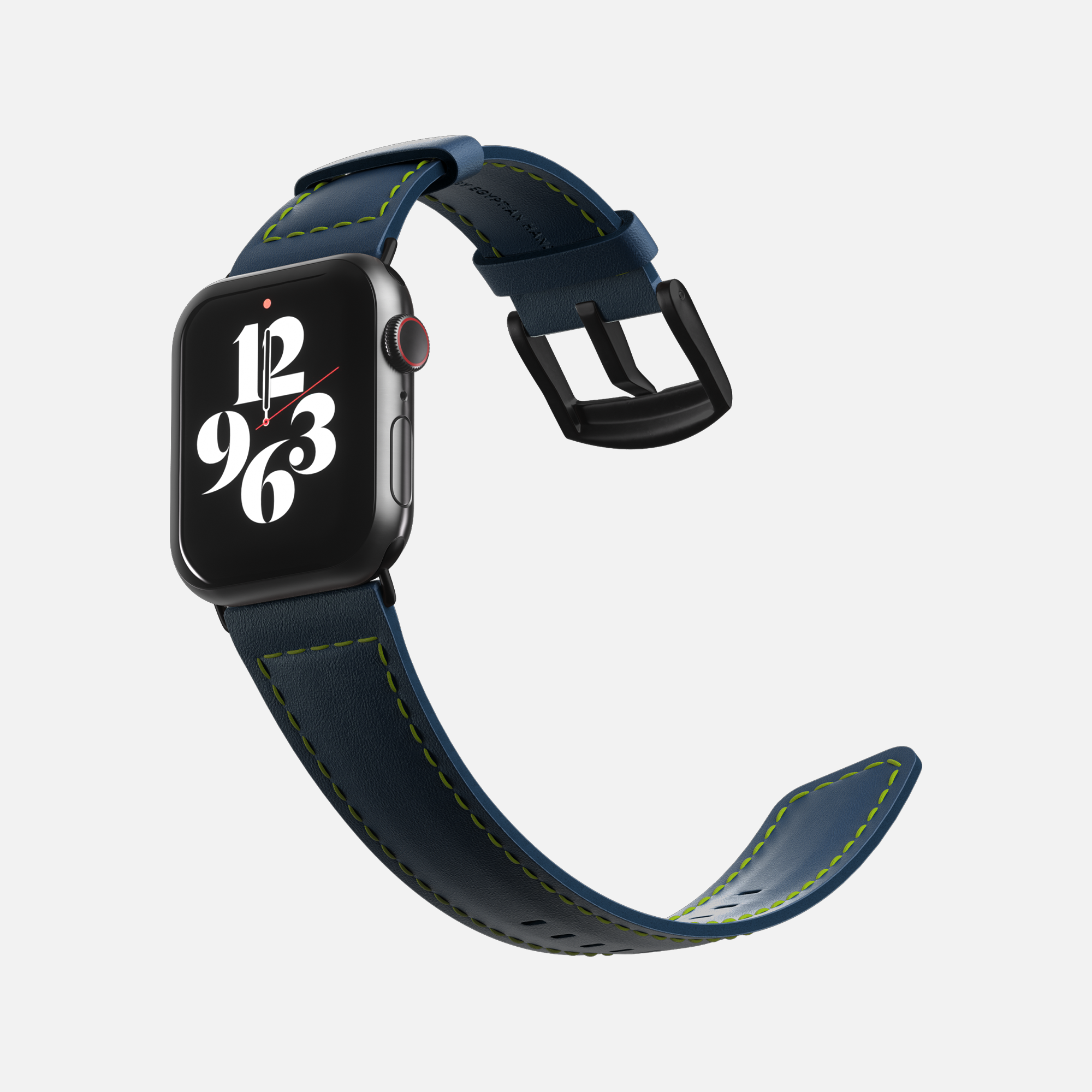 Modern Apple smartwatch with navy blue strap and customizable digital clock face floating on white background.