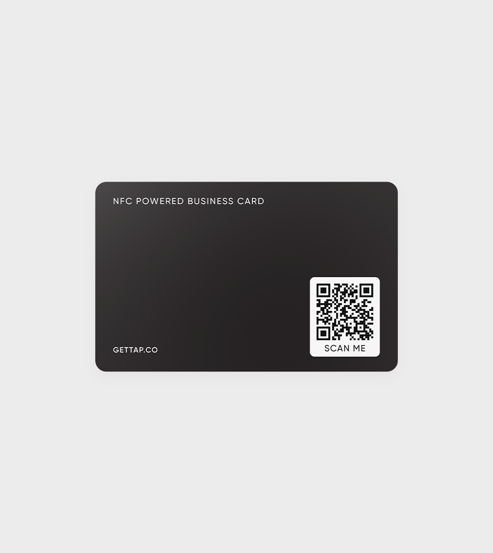 NFC business card backside with QR code on black surface.