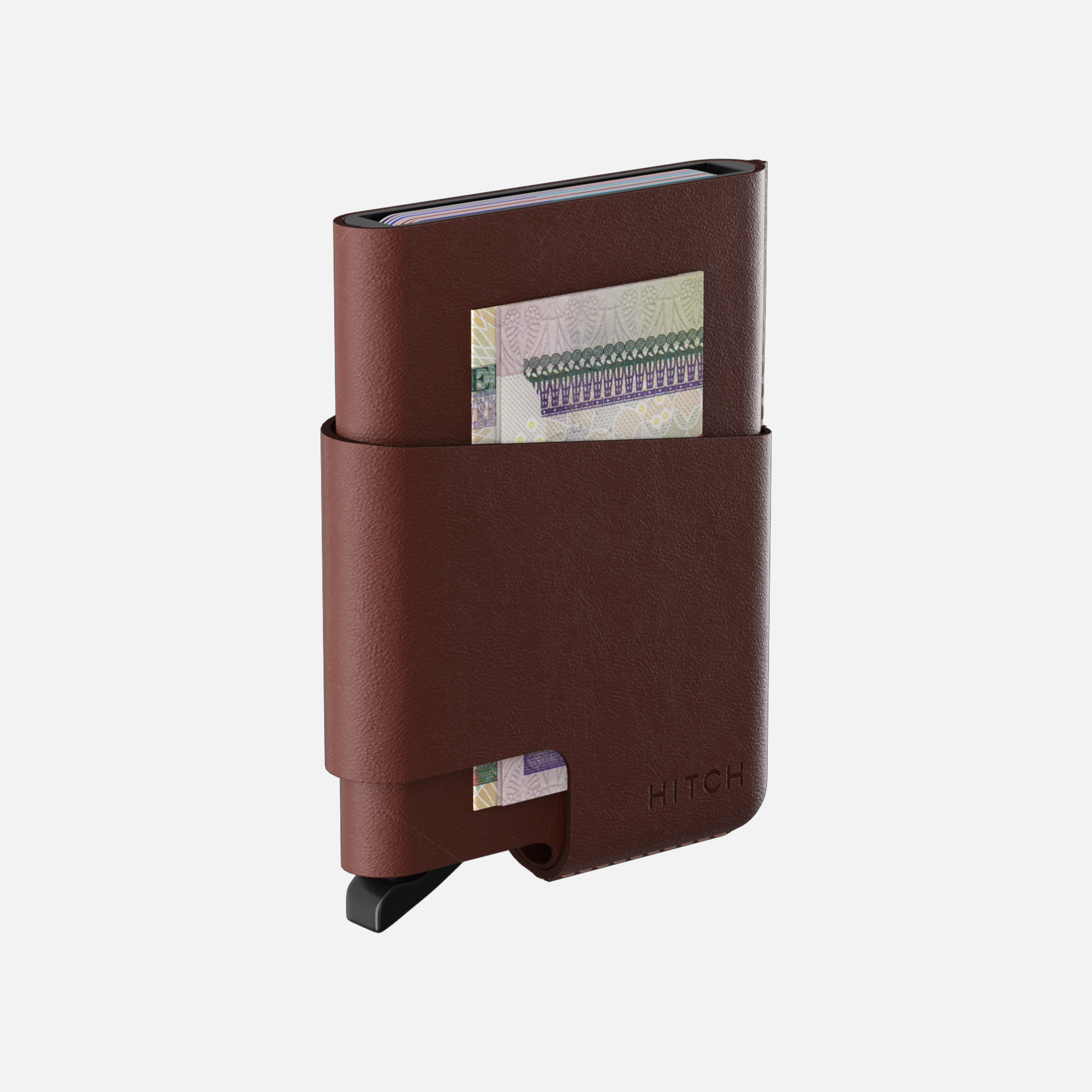 Minimalist brown leather wallet with slotted money clip.