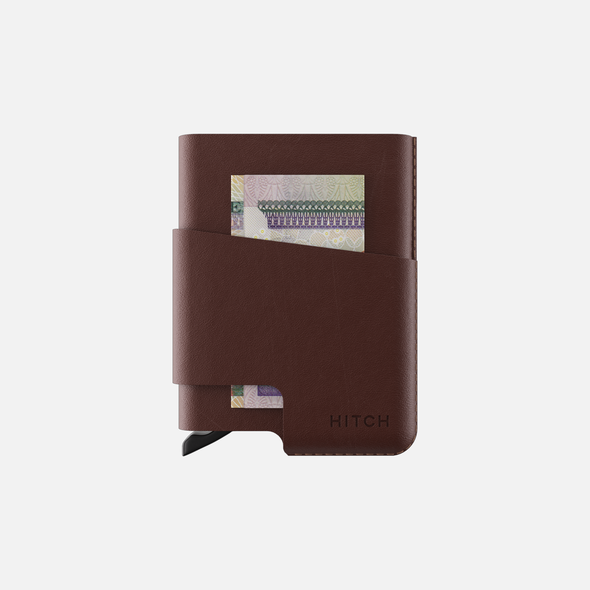 Brown wallet with Egyptian currency note in money clip.