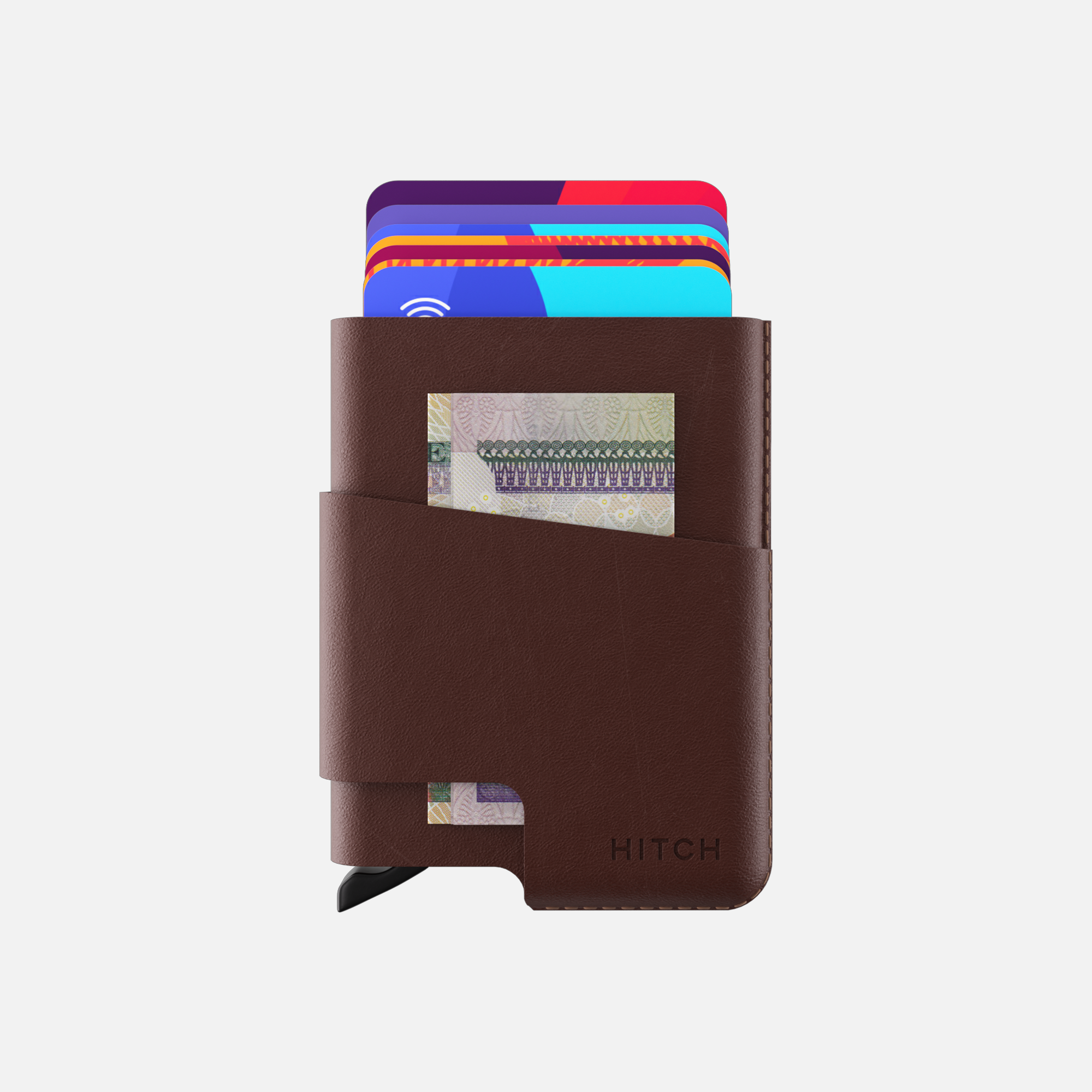 Brown leather wallet holding credit cards and cash banknote.