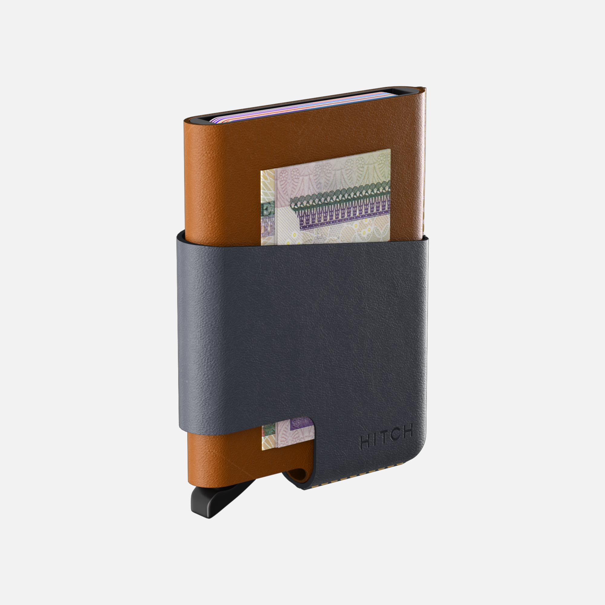 Brown and black leather cardholder wallet with cash peeking out against a white background.
