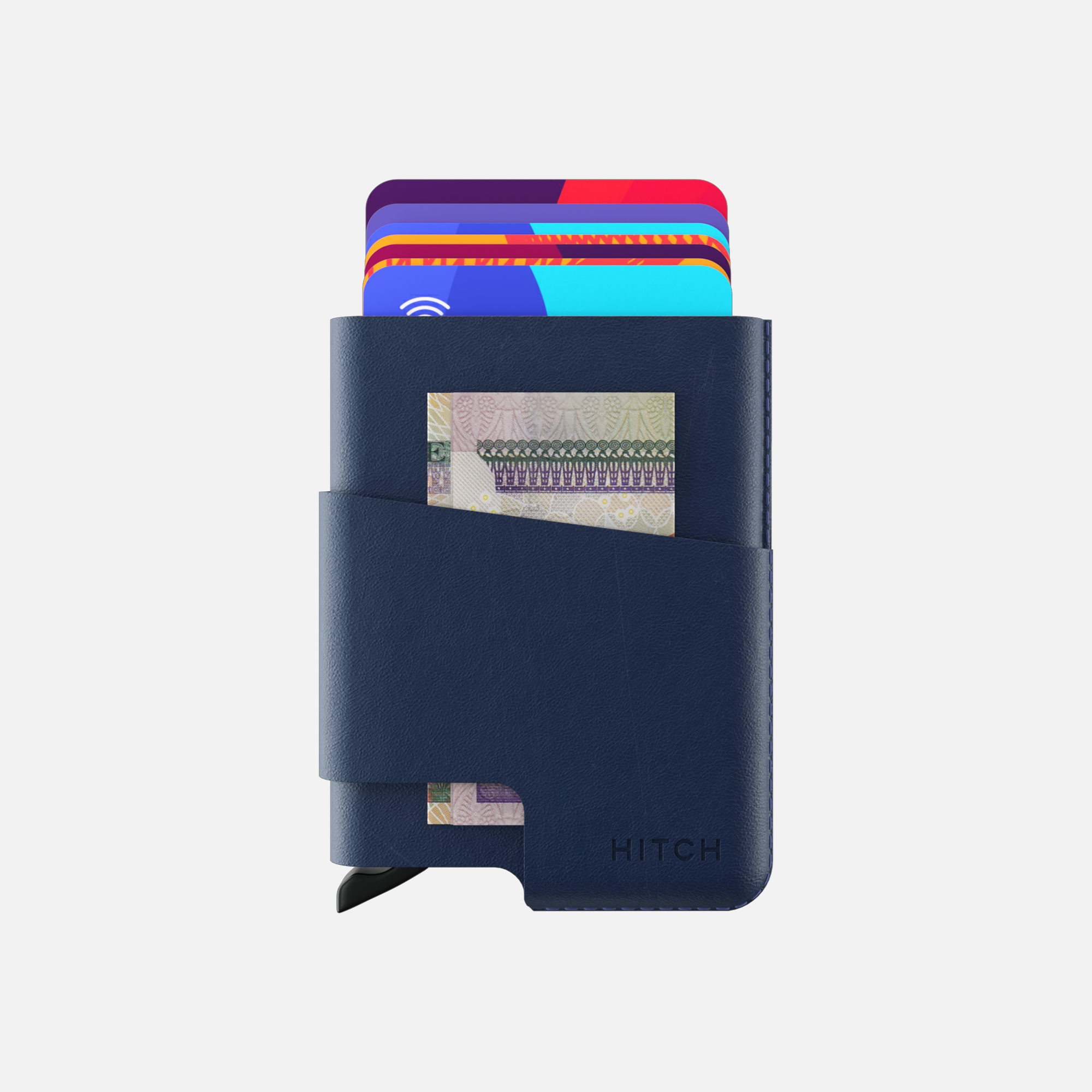 Navy blue leather cardholder wallet with multiple credit cards and cash visible on white background.