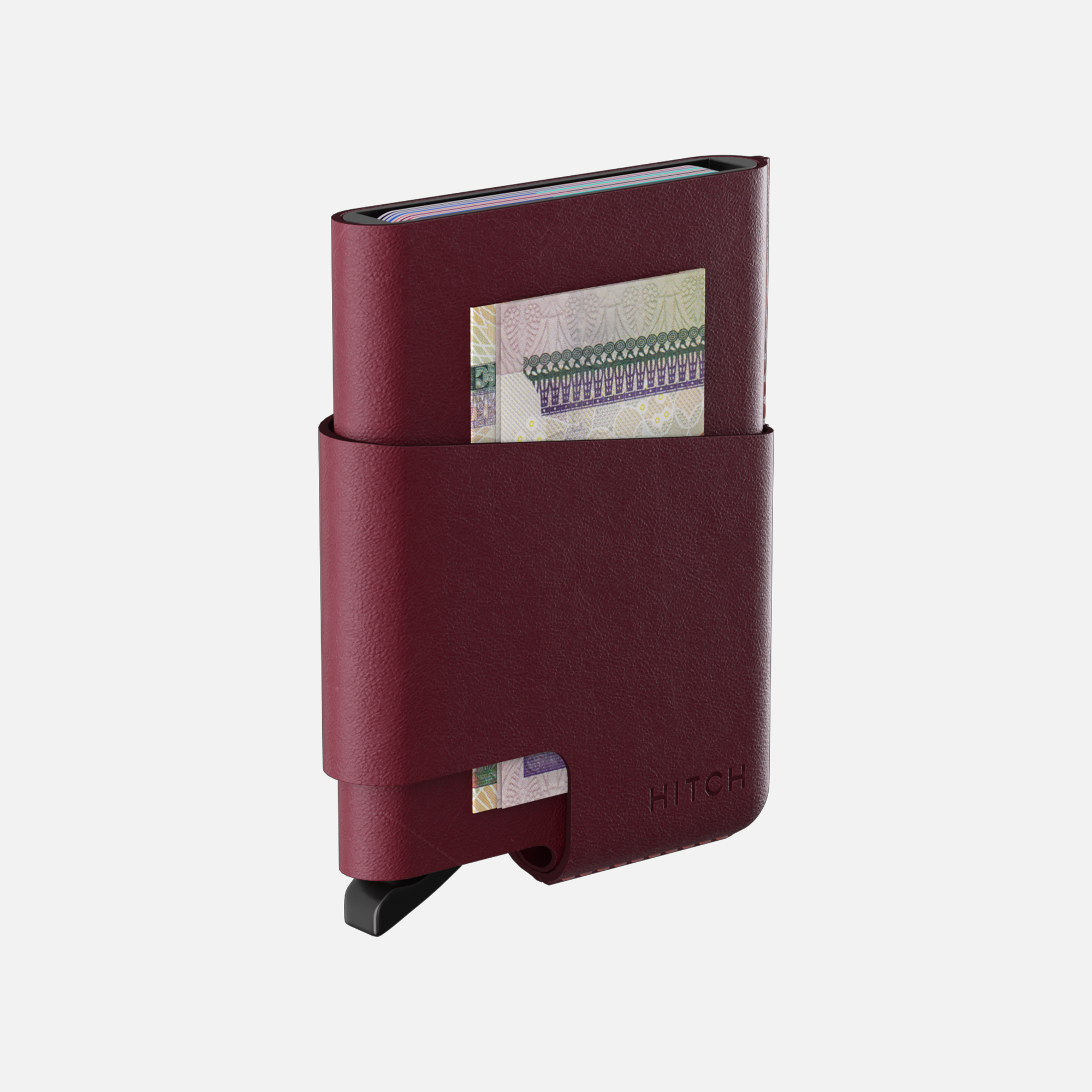 Burgundy leather cardholder wallet with bill compartment, embossed "HITCH" brand logo, isolated on white background.