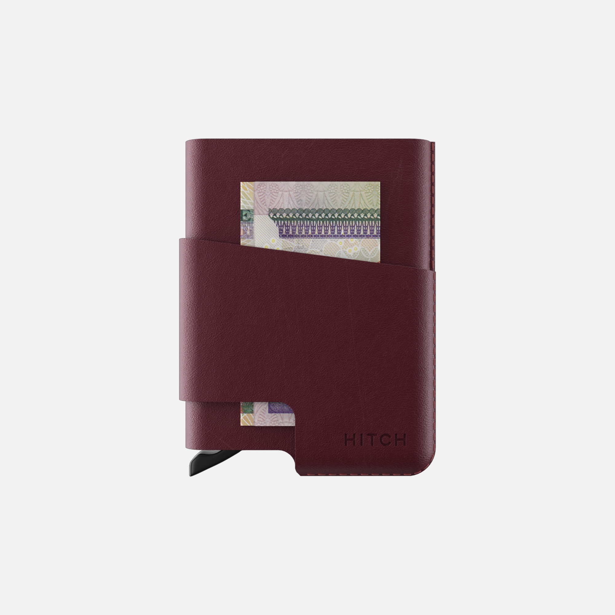 Burgundy leather cardholder wallet with money slot, embossed with brand "HITCH".
