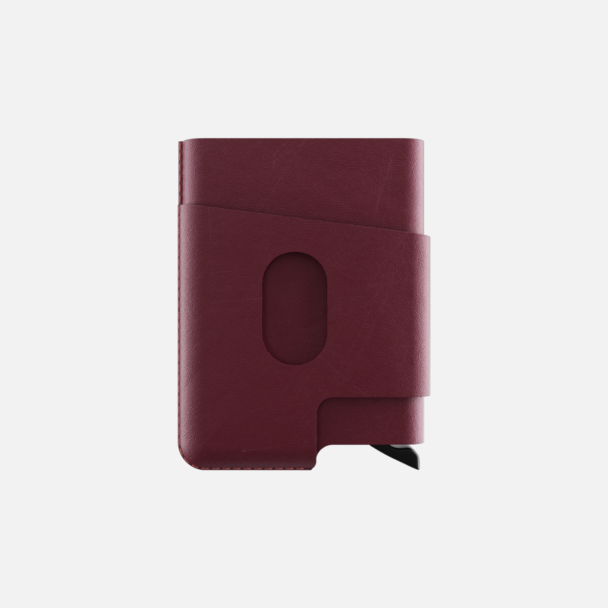 Burgundy leather cardholder wallet with strap closure isolated on white background.