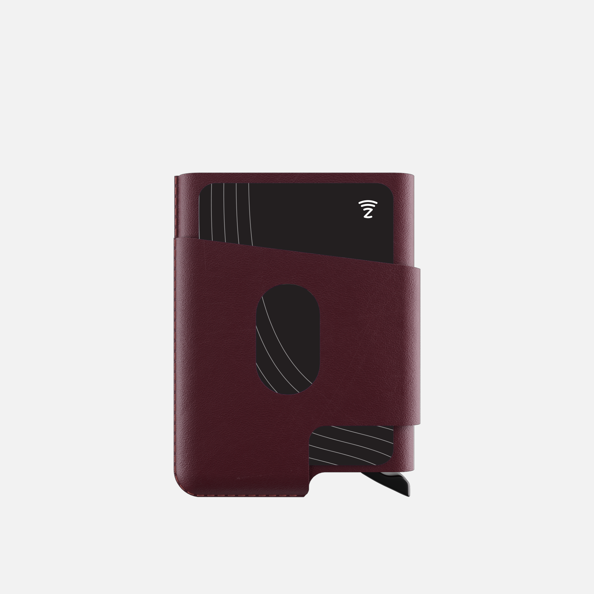 Burgundy leather cardholder wallet with black credit card visible, isolated on white background.