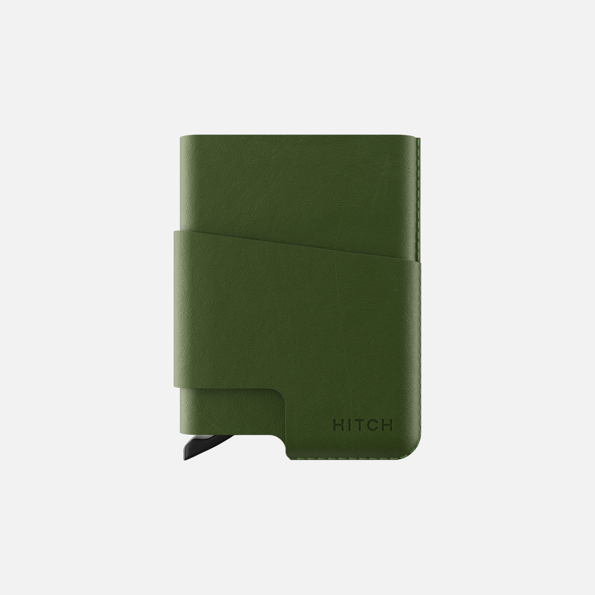 Green leather cardholder wallet with elastic closure on a white background.