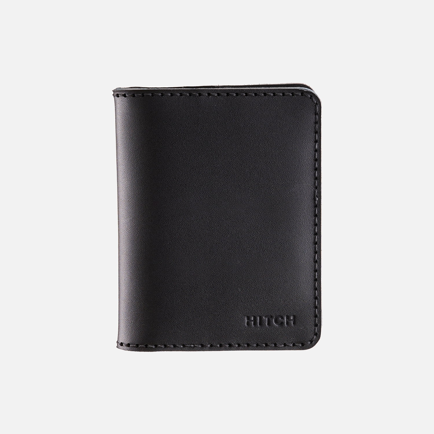 Black leather bifold wallet with stitched edges on a white background.