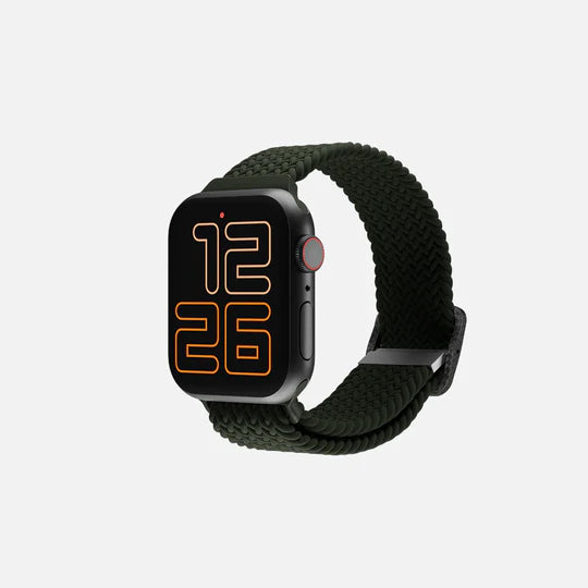 Smartwatch with a braided green band and digital clock face displayed on a neutral background.