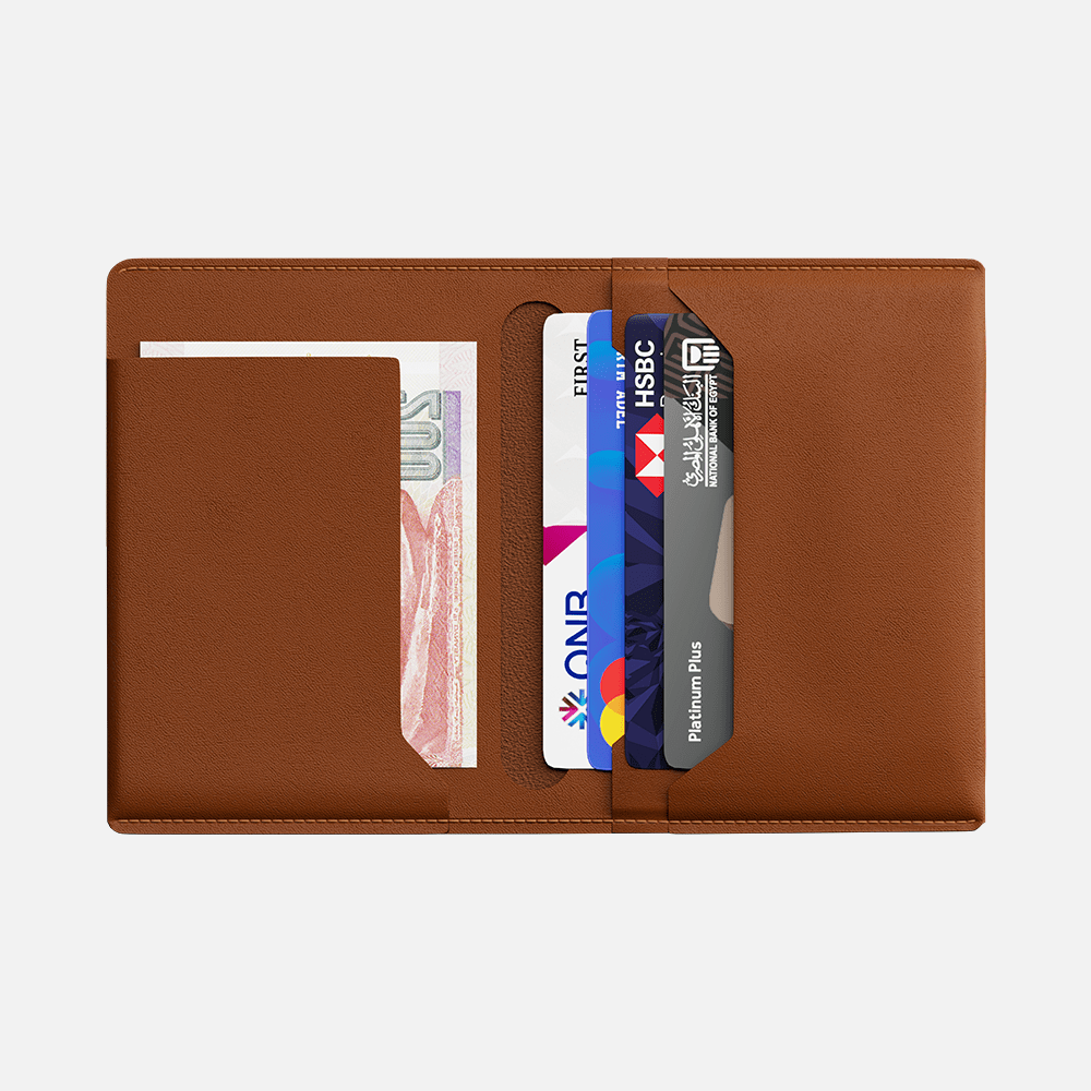 Brown leather bifold wallet with cash and multiple credit cards visible.