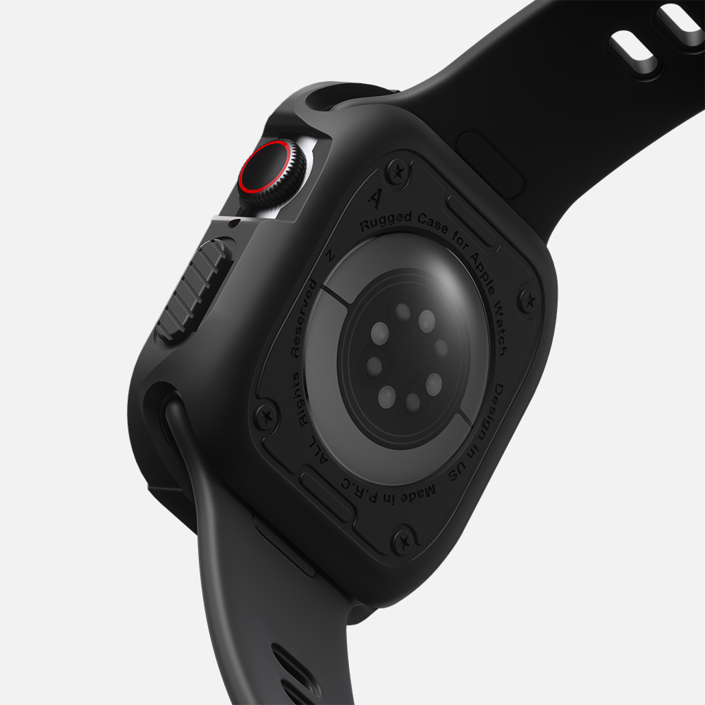 Black smartwatch with red digital crown and rugged case, focusing on back sensors and design details.