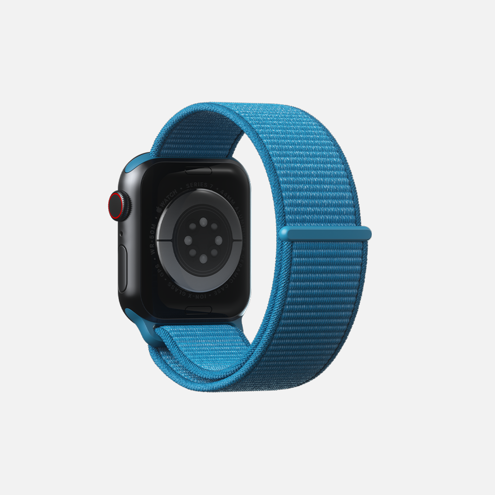 Blue smartwatch with sports band on white background
