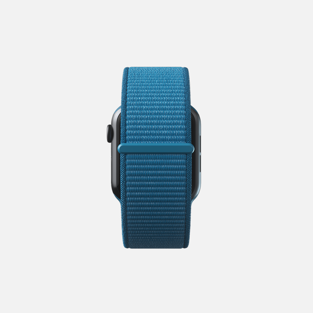 Blue smartwatch with textured band on white background.