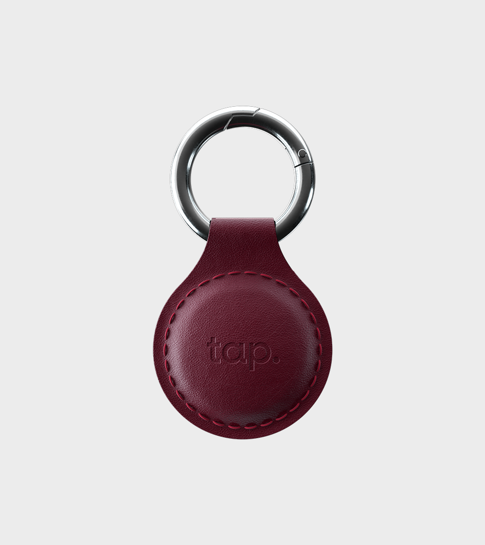 Leather keychain with a metal ring and logo embossment for digital NFC business cards