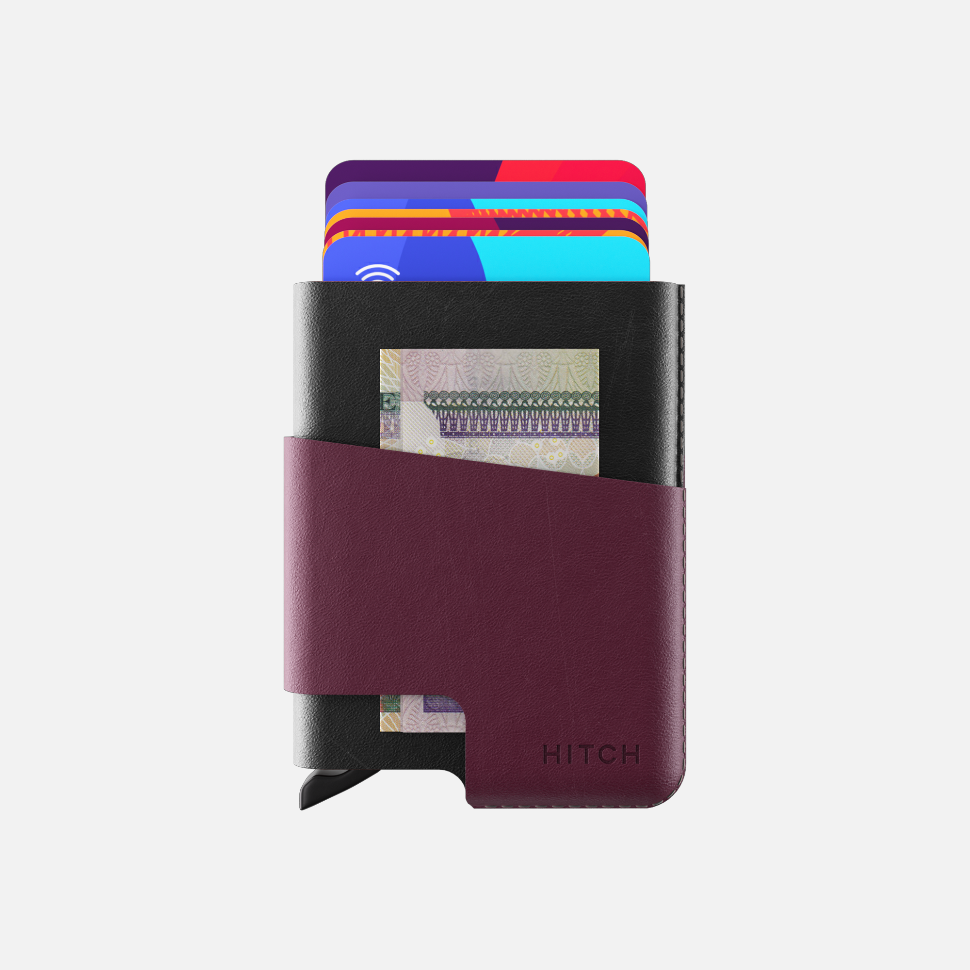 Purple and black leather cardholder wallet with cards and cash on white background.
