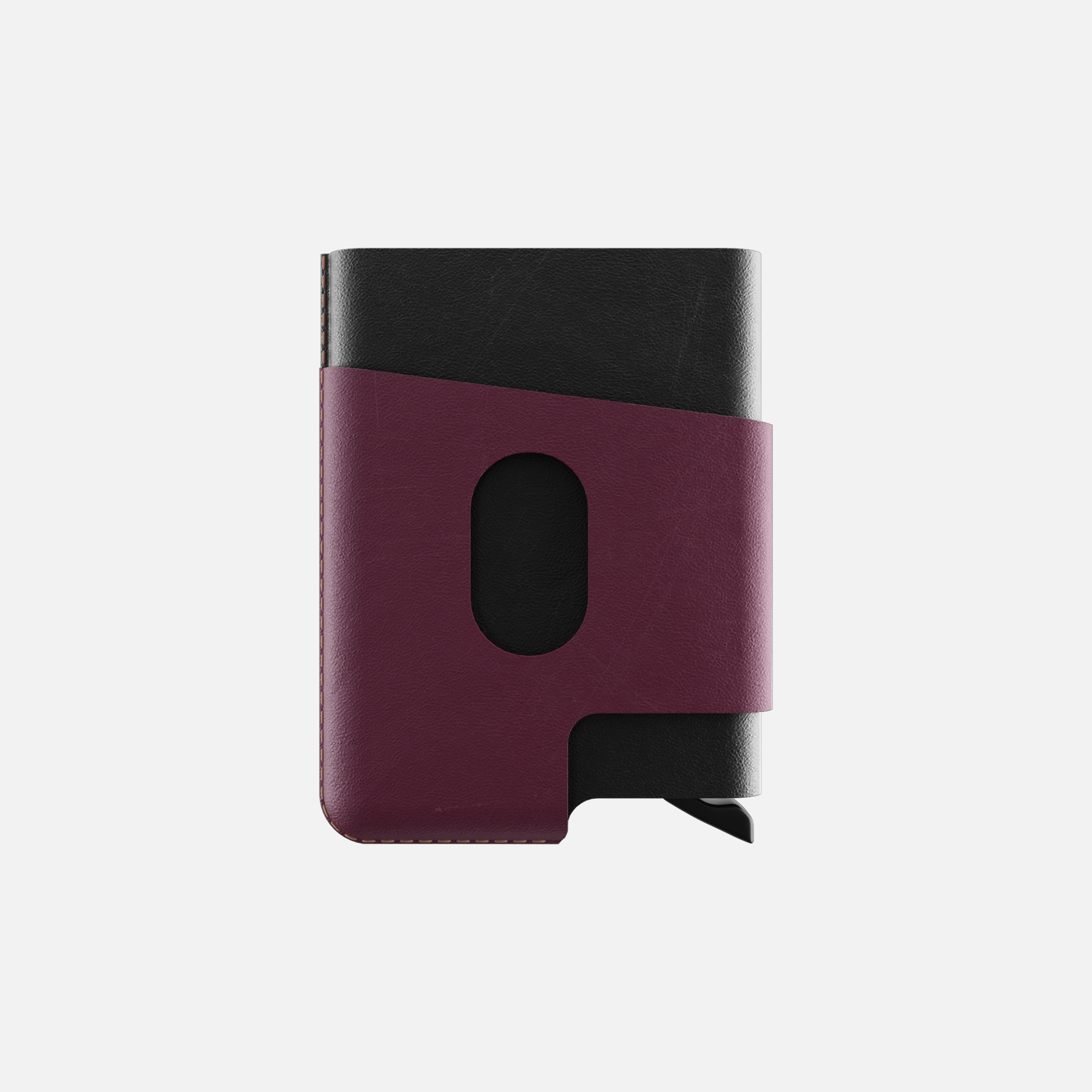 Black and maroon leather notebook with elastic closure, isolated on a white background."