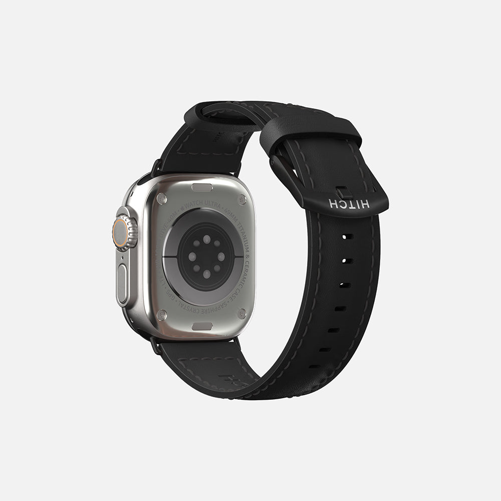 Silver Apple  smartwatch with black strap on a white background, showcasing modern wearable technology.