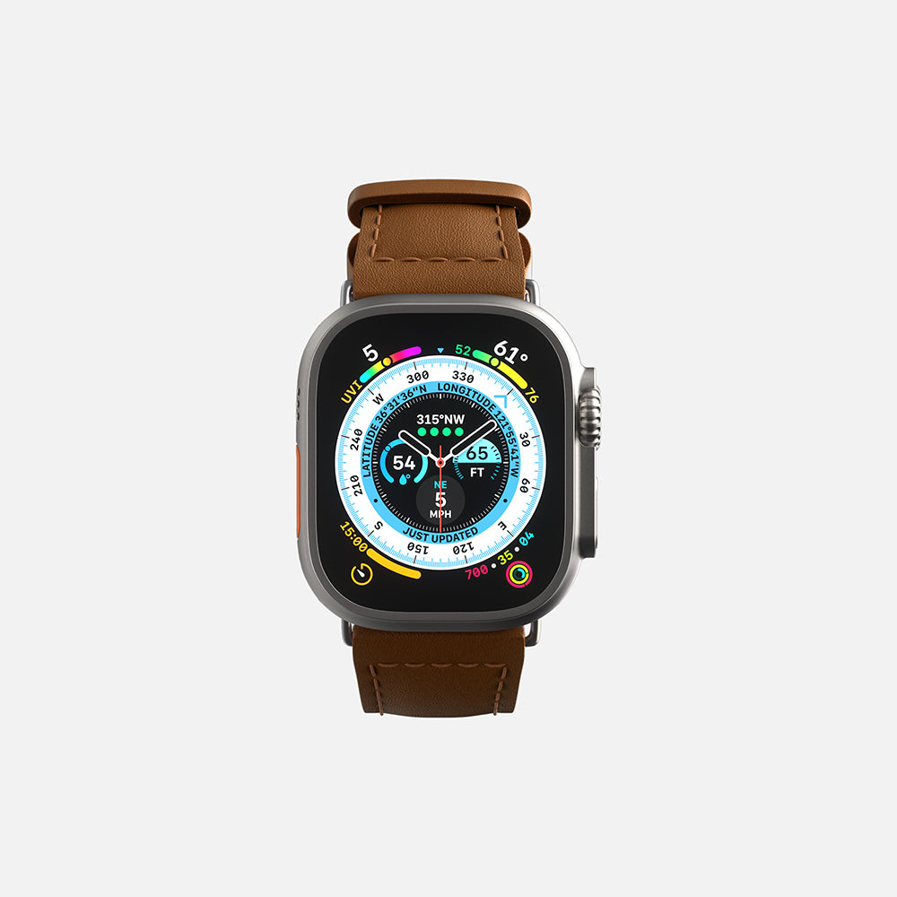 Apple Smartwatch with brown leather strap and detailed analog-digital display face on white background.