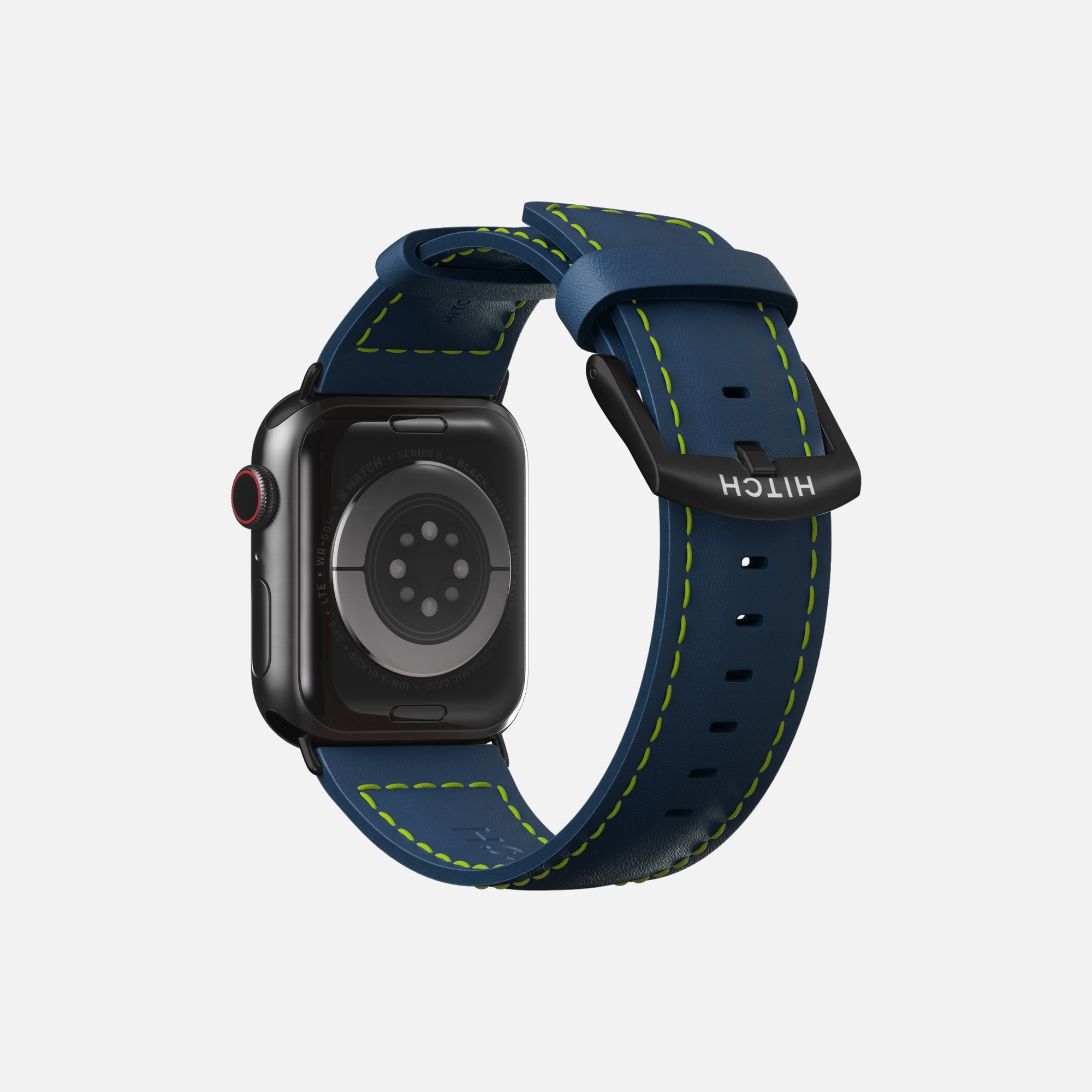 Apple Smartwatch with a navy blue strap and green stitching, isolated on a white background."