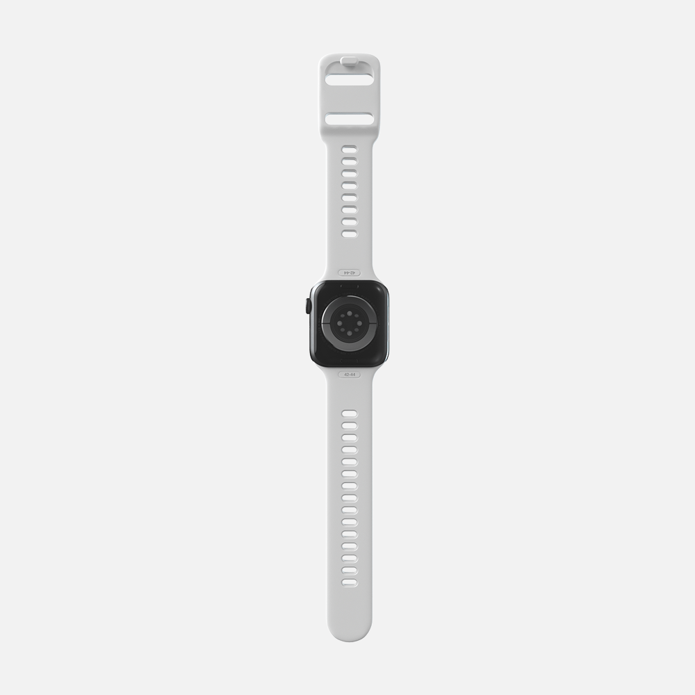 Modern smartwatch with white band on a white background.