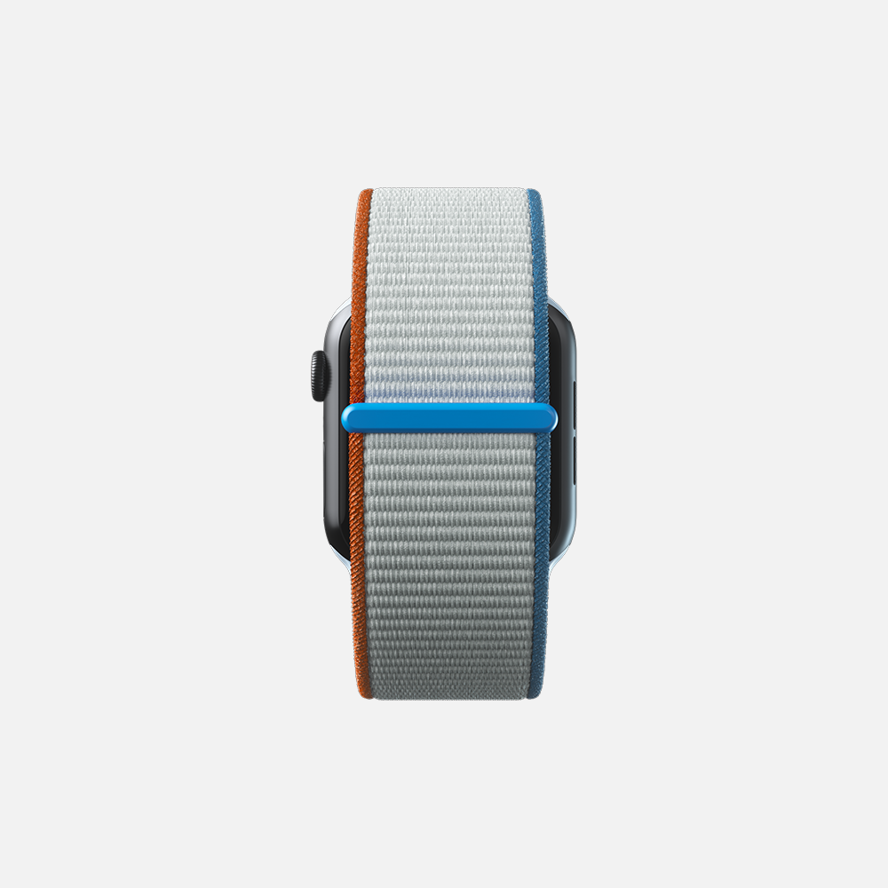 Smartwatch with textured strap and blue, red and orange loop on white background.
