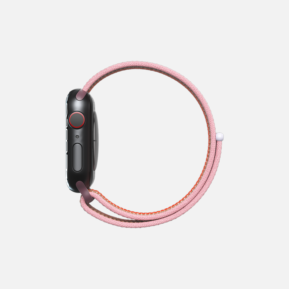 Side view of a smartwatch with pink loop band on white background