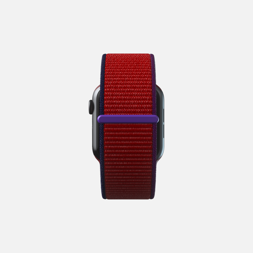 Red and purple woven smartwatch band on a grey smartwatch, isolated on white background.