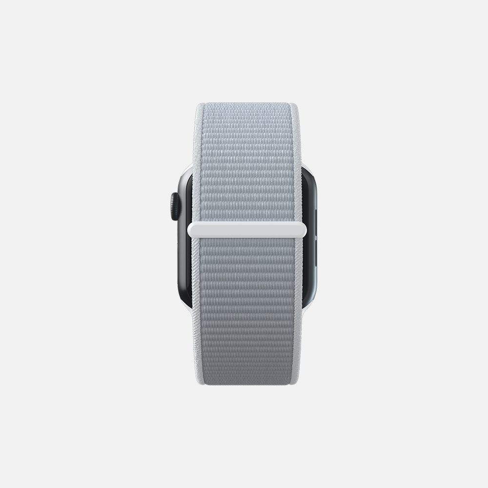 Smartwatch with gray sport loop band isolated on white background.
